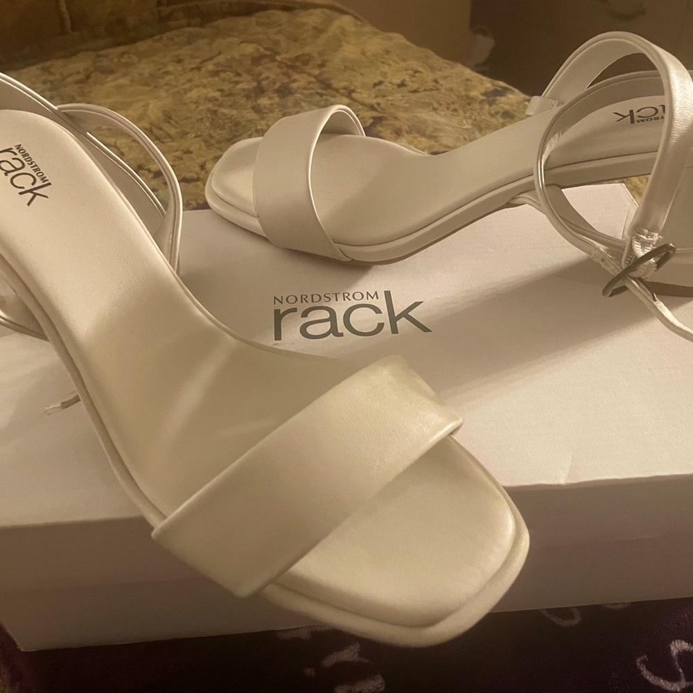 Cream heeled Sandel, very comfortable, wrap around the ankle, only worn once.